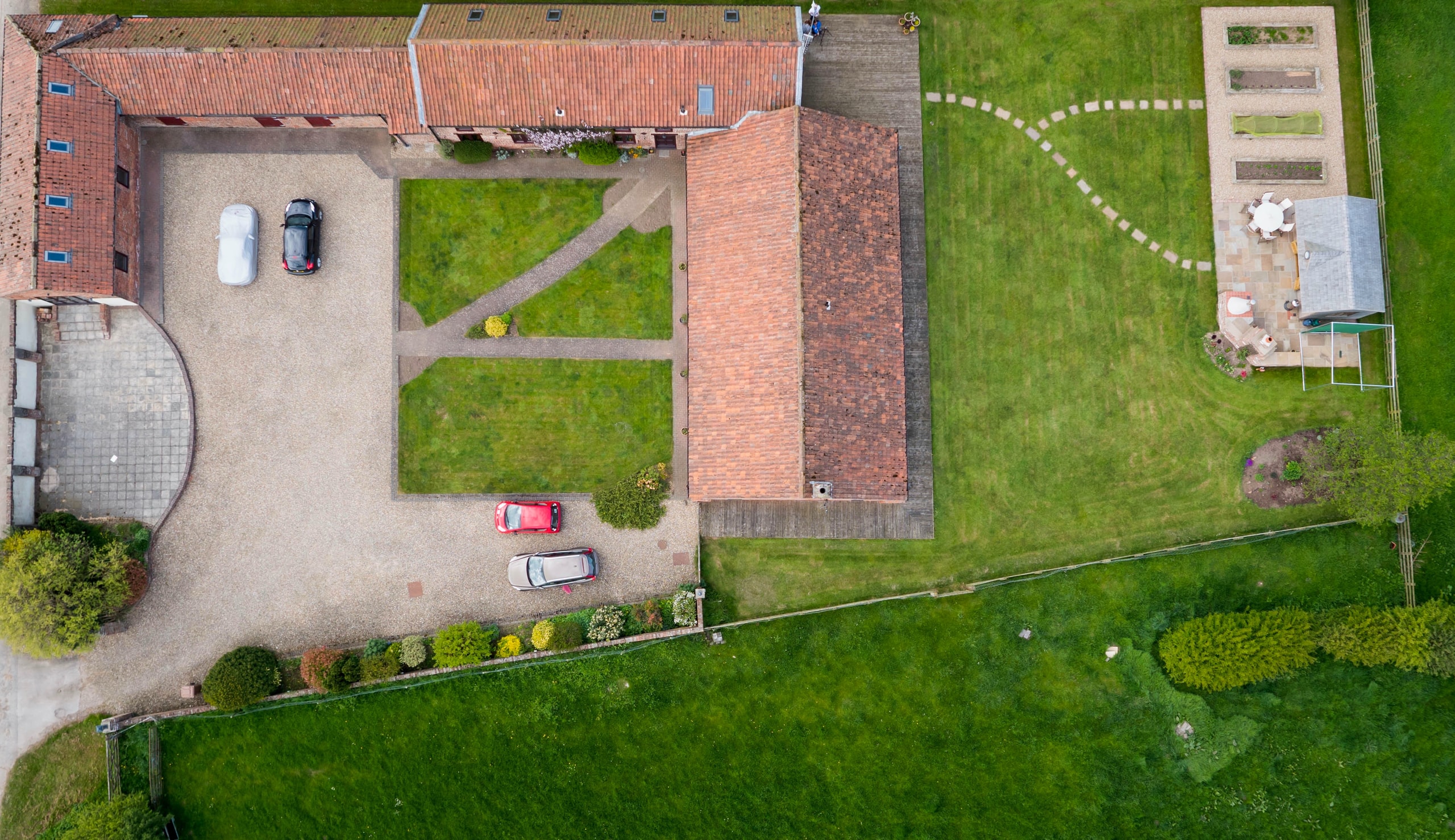 Top-down aerial view of an Essex country property and its grounds